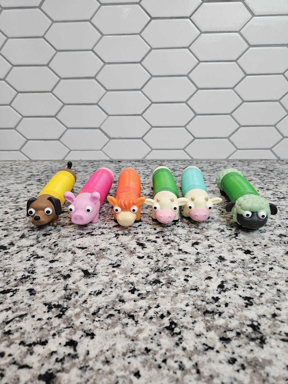 Set of 6 Colorful Farm Animal Pop Tube Toys - Pink, Yellow, Orange, Green